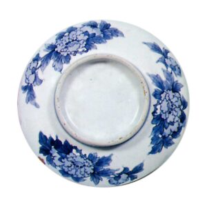 Dishes with design of bands of cherry blossoms.celadon glaze. and blue and white on reserved area
