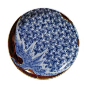 Dish with egg･plant design. blue and white. partly covered with brown glaze