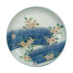 Dish with design of cherries along brushwood fences. underglaze blue. overglaze enamels