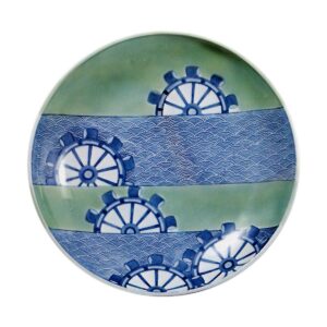 Dish with design of water mills and seigaiha (conventionalized overlap ping waves). blue and white. partial celadon giaze on reserved area