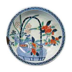 Disn with design of camellias in pots, undergiaze blue, overgiaze enamels