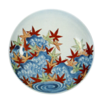 Dish with design of maple leaves afloat on stream, undergiaze blue,overglaze enamels