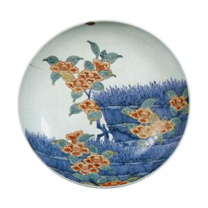 Dish with design of camellias along brushwood fences, underglaze blue. overglaze enamels