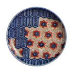 Dish with design of hexagons and karahana flower,underglaze blue. overglaze enamels