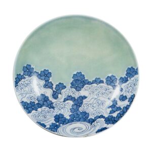 Dish with cherry blossom and water stream design, celadon giaze. and blue and white