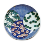 Dish with design of circles decorated with pines, bamboos and plums, underglaze blue. overglaze enamels