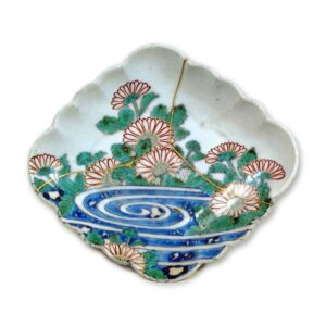 Lozenge-shaped dish with design of chrysanthemums and water streams, underglaze blue. overglaze enamels