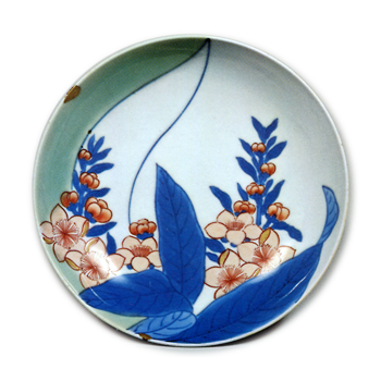 Dish with peach blossom design, underglaze blue. overglaze enamels. and partial celadon glaze