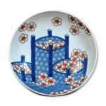 Dish with design of bamboo baskets full of cherry blossoms. underglaze blue, overgiaze enamels