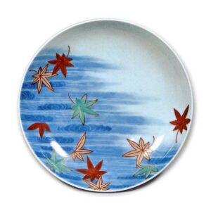 Dish with design of maple leaves afloat on water streanri,undergtaze blue. overglaze enamels