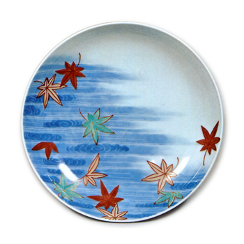 Dish with design of maple leaves afloat on water streanri,undergtaze blue. overglaze enamels