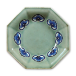 Dish with design or nyoigashira (head of abbot's baton), blue and white reserved against celadon glaze