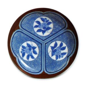 Dish with design of peonies in circles against katabami (wood･sorrel) plant, blue and white. partial brown glaze