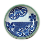 Dish with karahana flower design, blue and white,partial celadon glaze