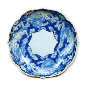 Dish with dragon design. blue and white