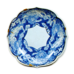 Dish with dragon design. blue and white