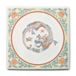 Plaque with rounded dragon design, enamelled ware