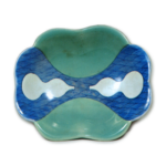 Dish with design of gourds and seigaiha waves, blue and white,partial celadon glaze on reserved area