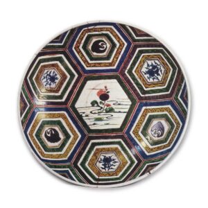 Large dish with design of hexagons and chrysanthemum spray afloat, enamelled ware