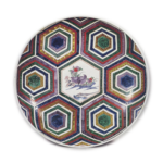 Large dish with design of hexagons and quails, enamelled ware