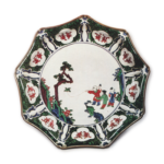 Nonagonal dish with design of Chinese children playing with bird, enamelled ware