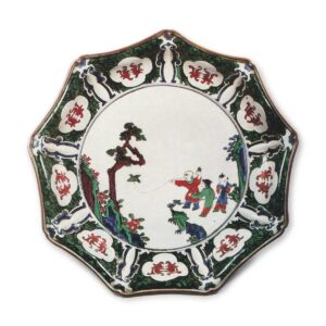 Nonagonal dish with design of Chinese children playing with bird, enamelled ware