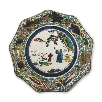 Nonagonal dish with design of Chinese figures on the rocks, enamelled ware