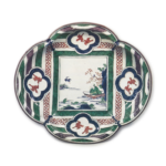 Large lobed dish with design of angler, enamelled ware