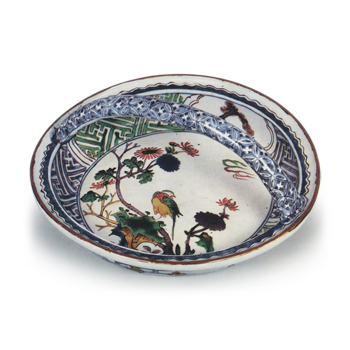 Bowl with handle across mouth with flower-and-bird design, enamelled ware