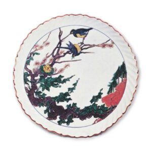 Dish in the shape of open flower with design of two birds in tree, enamelled ware