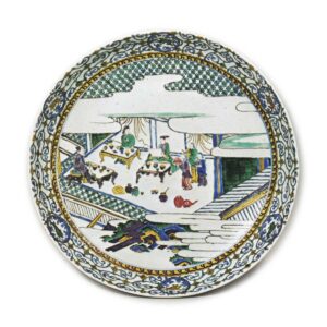 Large dish with wine party design, enamelled ware