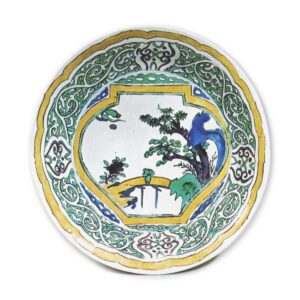 Large bowl with desin of jar showing landscape with a figure on the bridge, enamelled ware