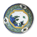 Large dish with design of jar showing landscape with a flying bird, enamelled ware