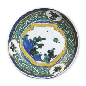 Large dish with design of jar showing landscape with a flying bird, enamelled ware