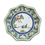 Nonagonal dish with design of figures resting on the rocks, enamelled ware