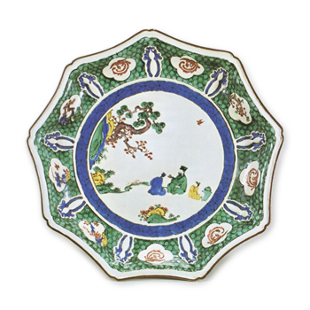 Nonagonal dish with design of figures resting on the rocks, enamelled ware