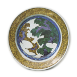 Large dish with hawk, tree and cloud design, enamelled ware