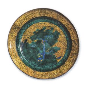 Large dish with design of landscape with houses, enamelled ware