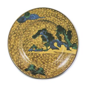 Large dish with design of seashore with pine-trees and houses,