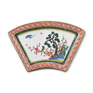 Fan-shaped dish with design of pine-tree, bamboo, plum-tree and bird, enamelled ware