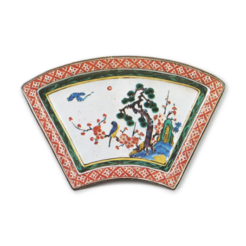 Fan-shaped dish with design of pine-tree, bamboo, plum-tree and bird, enamelled ware