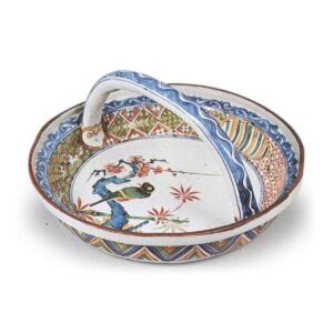 Bowl with handle across mouth, with design of pine-tree, bamboos and plum-tree, enamelled ware