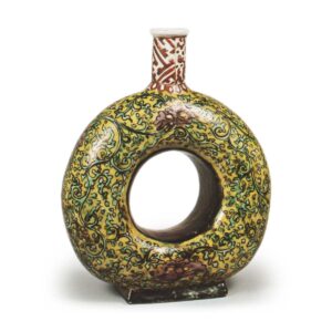 Circle-shaped wine bottle with floral arabesque design, enamelled ware