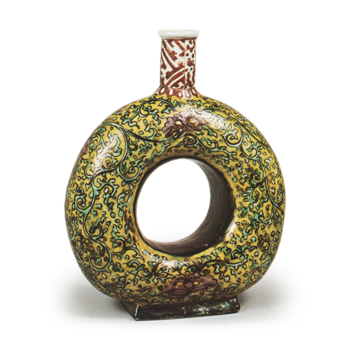 Circle-shaped wine bottle with floral arabesque design, enamelled ware