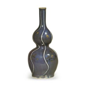 Gourd-shaped wine bottle with gold and silver ornaments over blue glaze