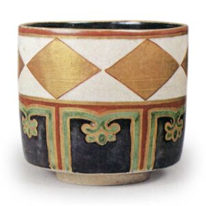 Ninsei: pair of tea bowls with lozenge design, enamelled ware with goldand silver decoration