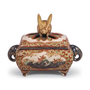 Ninsei: incense burner with Tatsuta River (maple and stream) designwith cover surmounted by rabbit knob, enamelled ware