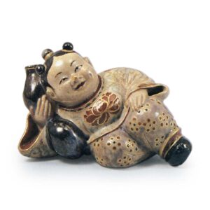 Ninsei: water dropper (for inkstone) in the shape of a Chinese baby,enamelled ware