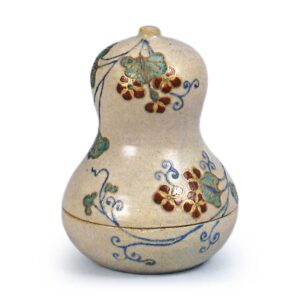 Ninsei: gourd-shaped incense caddy with floral scroll deign, enamelled ware