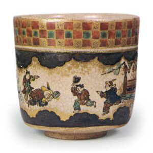 Ninsei: tea bowl with design of Chinese boys at play, enamelled ware